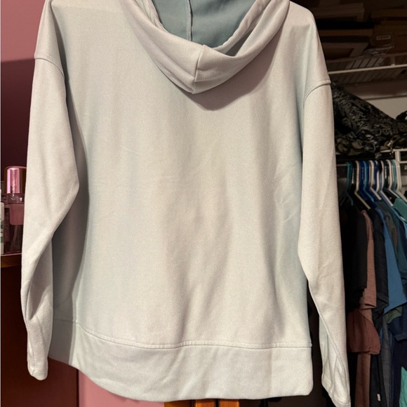 Women’s light blue hoodie.  Never worn. Has pockets in front. - Picture 3 of 4